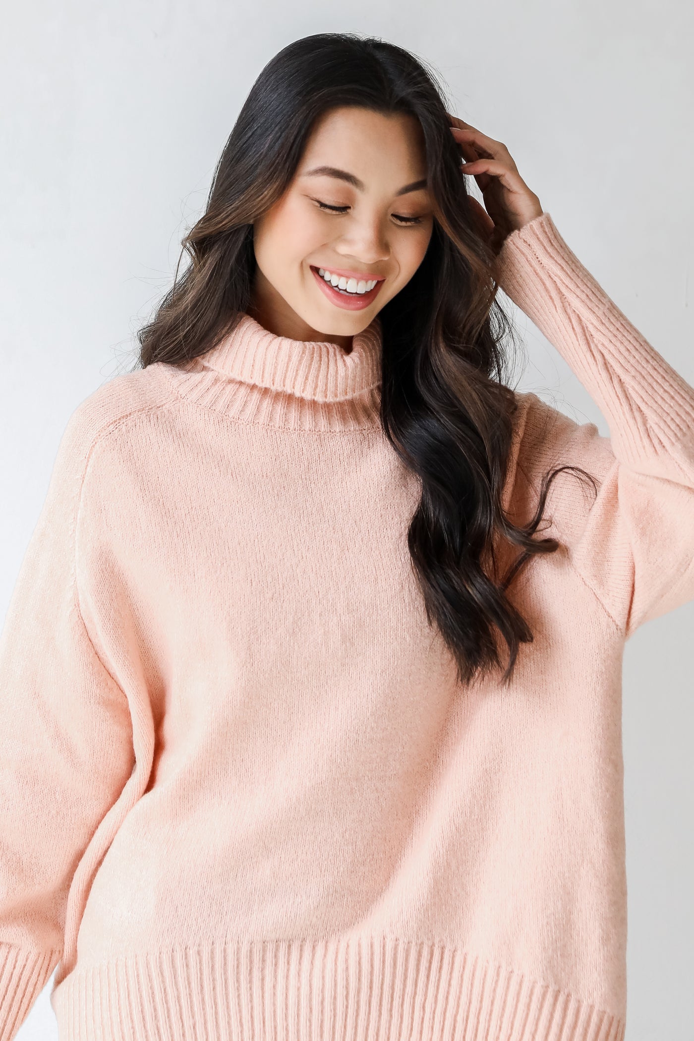 Turtleneck Sweater in blush close up