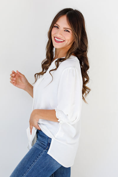 white puff sleeve blouse side view