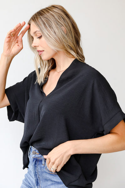 black blouse side view