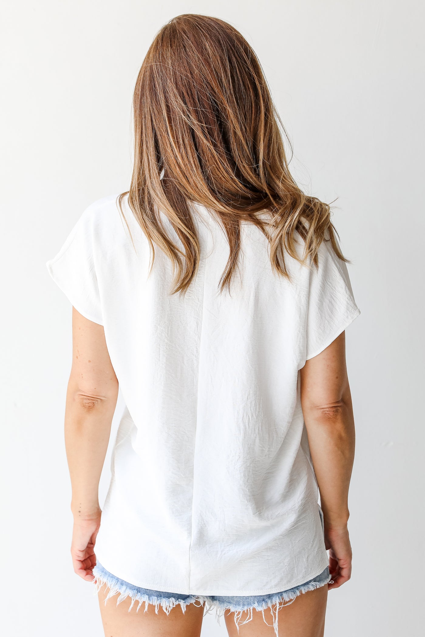 Blouse in white back view