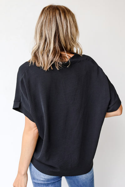 black blouse back view