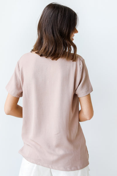 Blouse in taupe back view