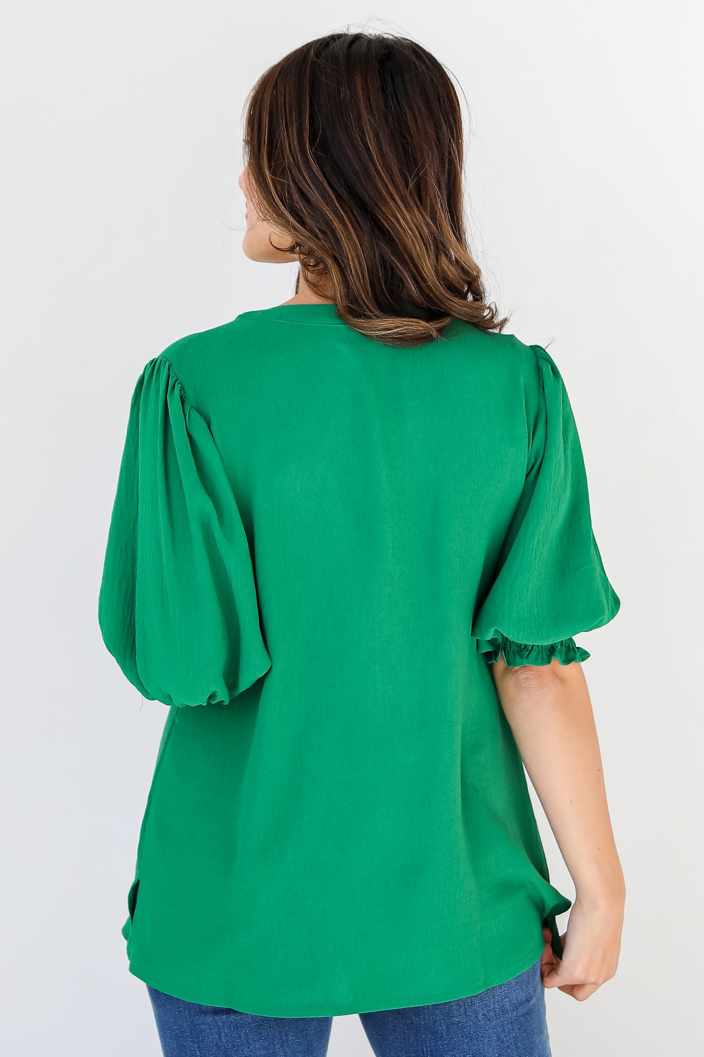 green puff sleeve blouse back view