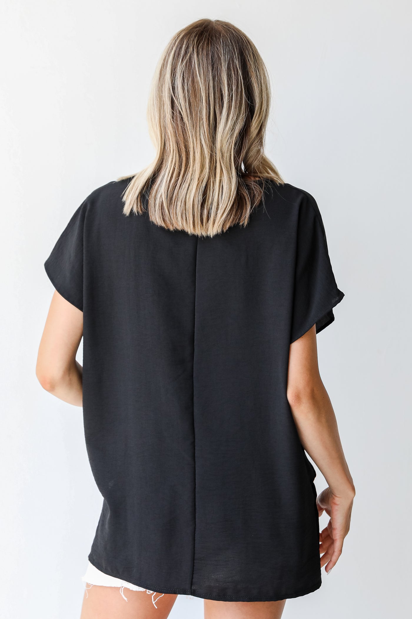 Blouse in black back view