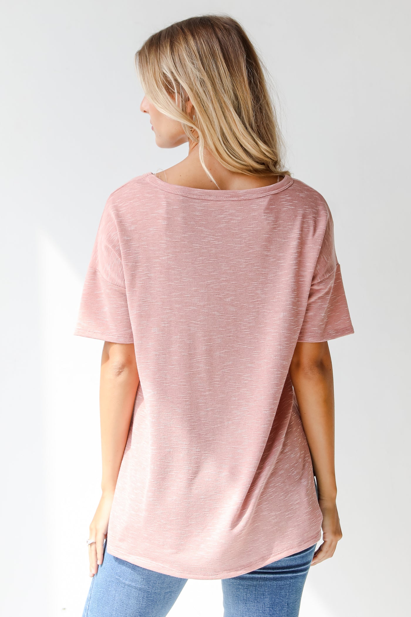 pink tee back view
