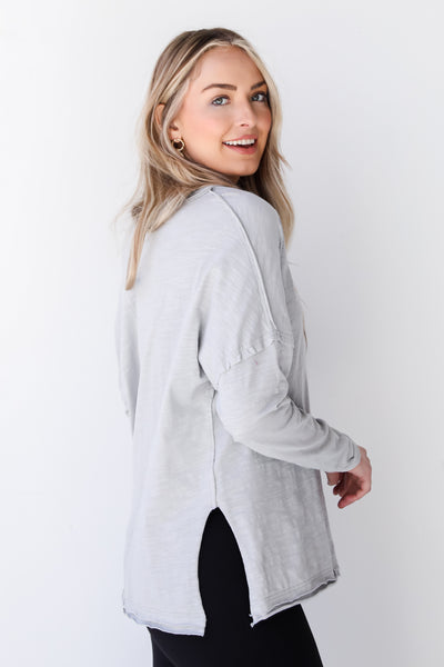 grey v-neck long sleeve tee side view