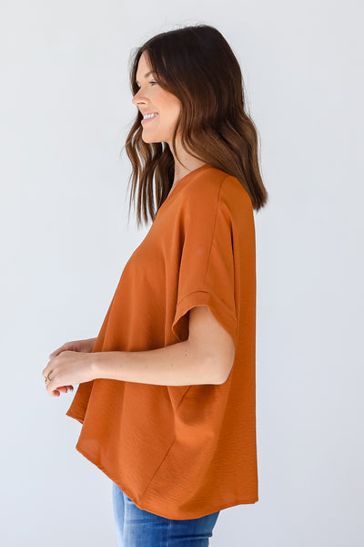 Blouse in camel side view