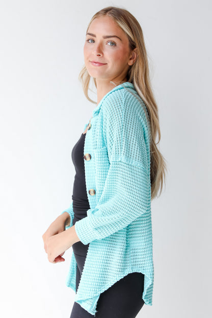 blue waffle knit top side view