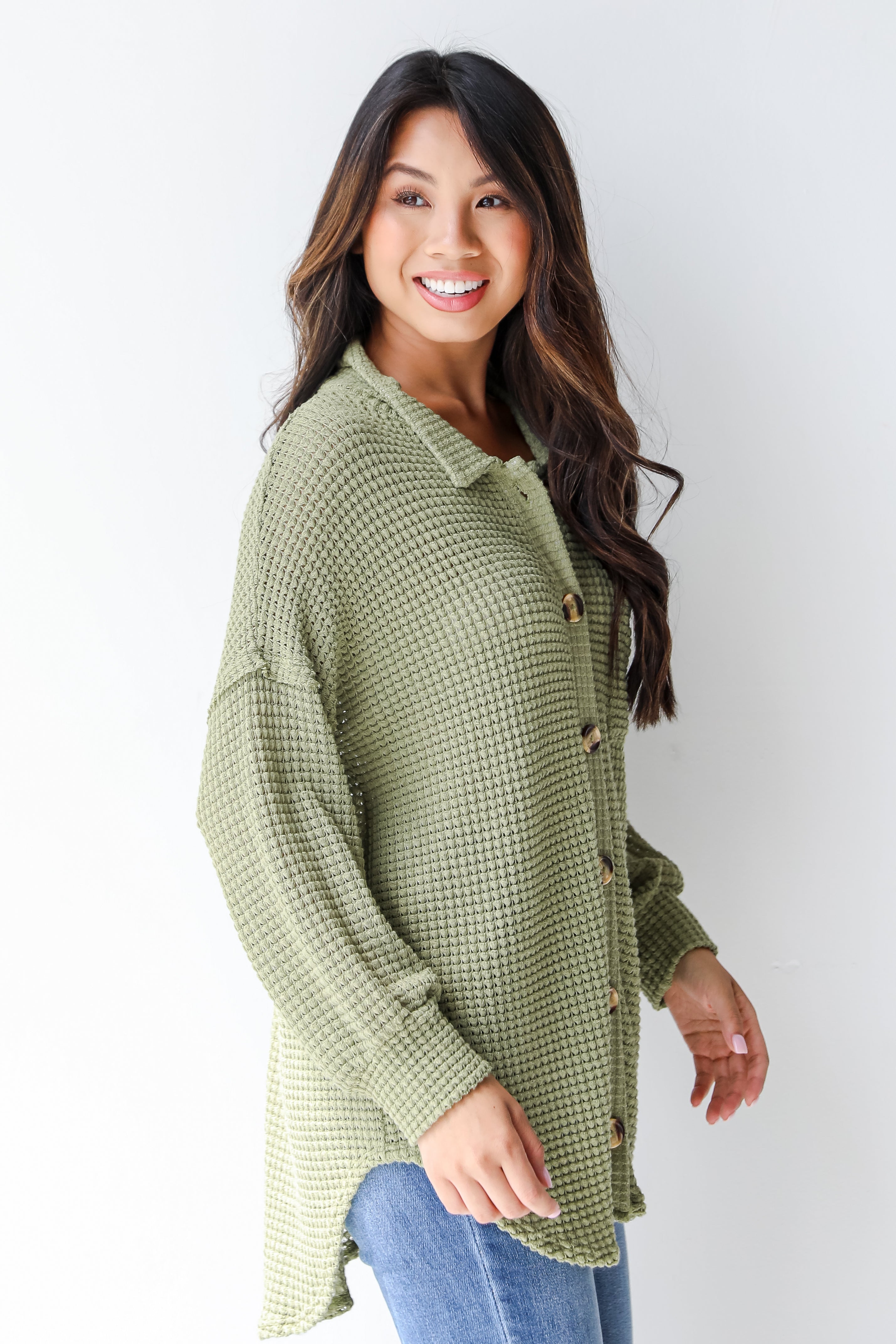 green waffle knit top side view