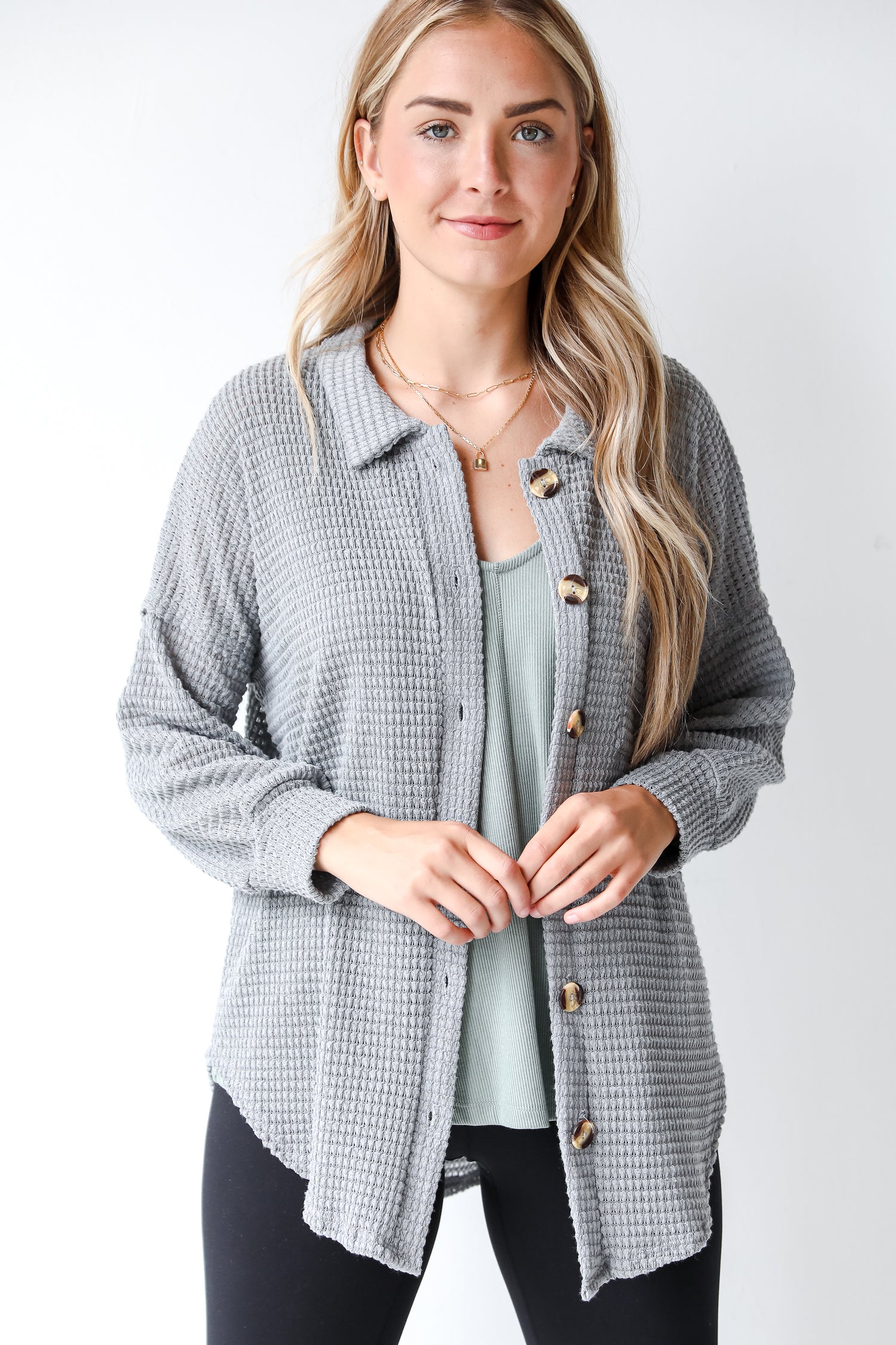 grey waffle knit top on model