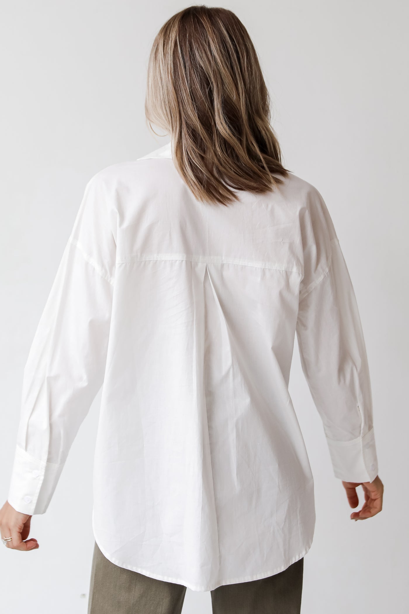 womens white button up back view
