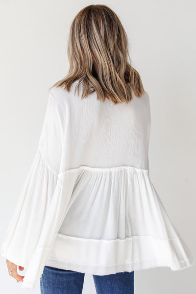back view of a white Linen Babydoll Blouse