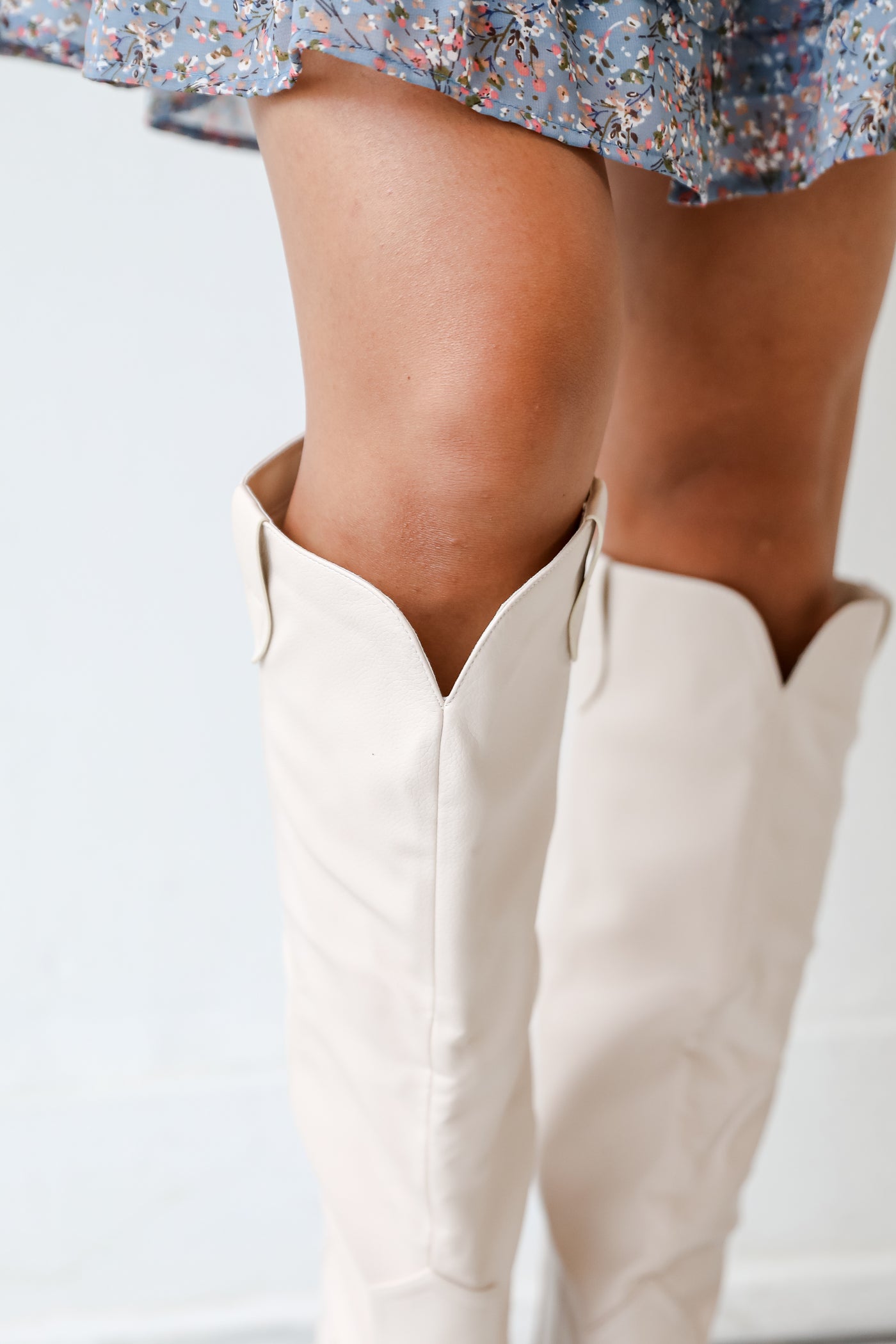 white tall boots close up