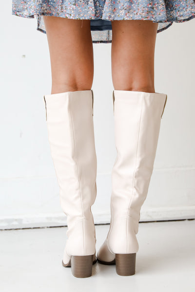 white tall boots back view