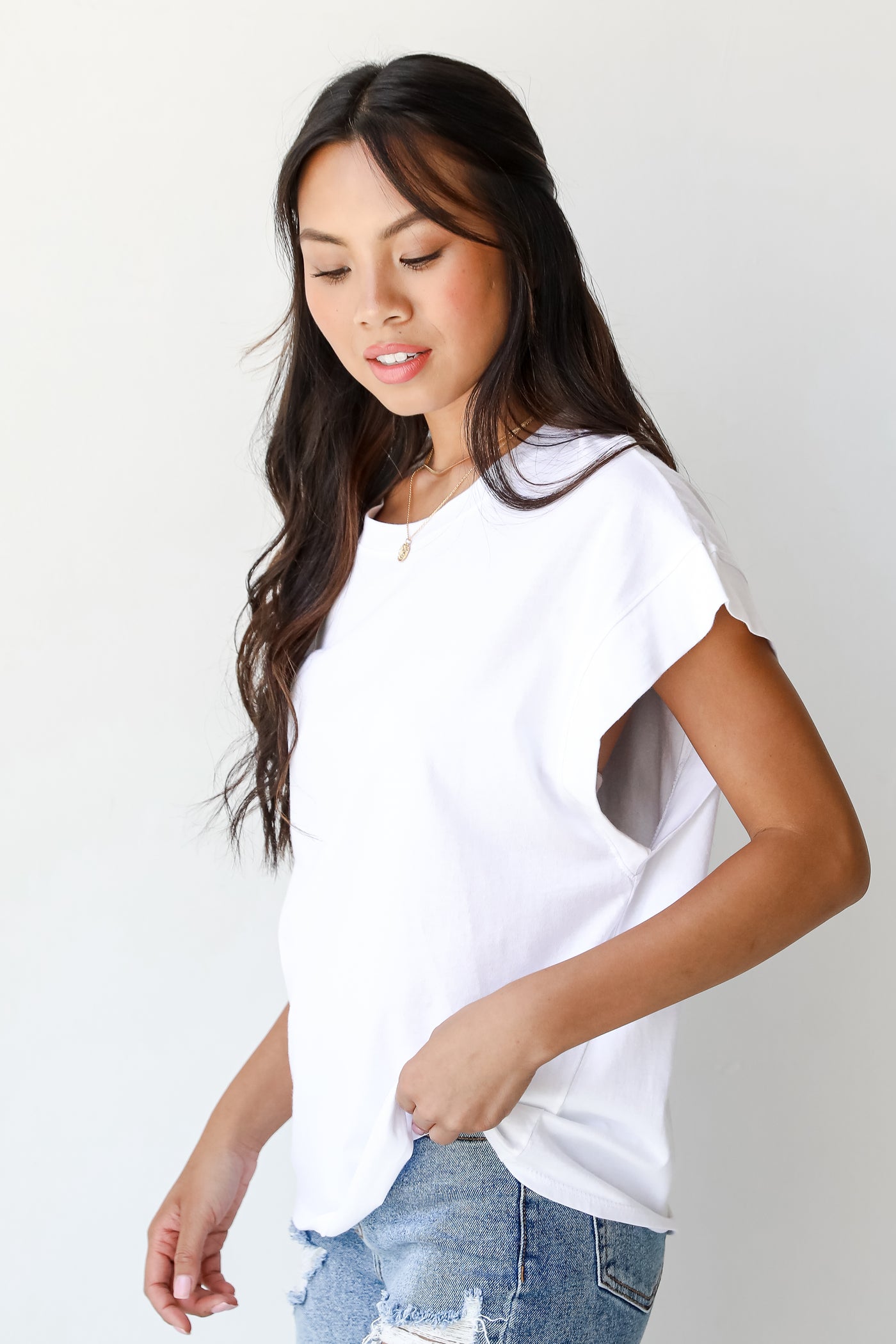 side view of a basic white tee