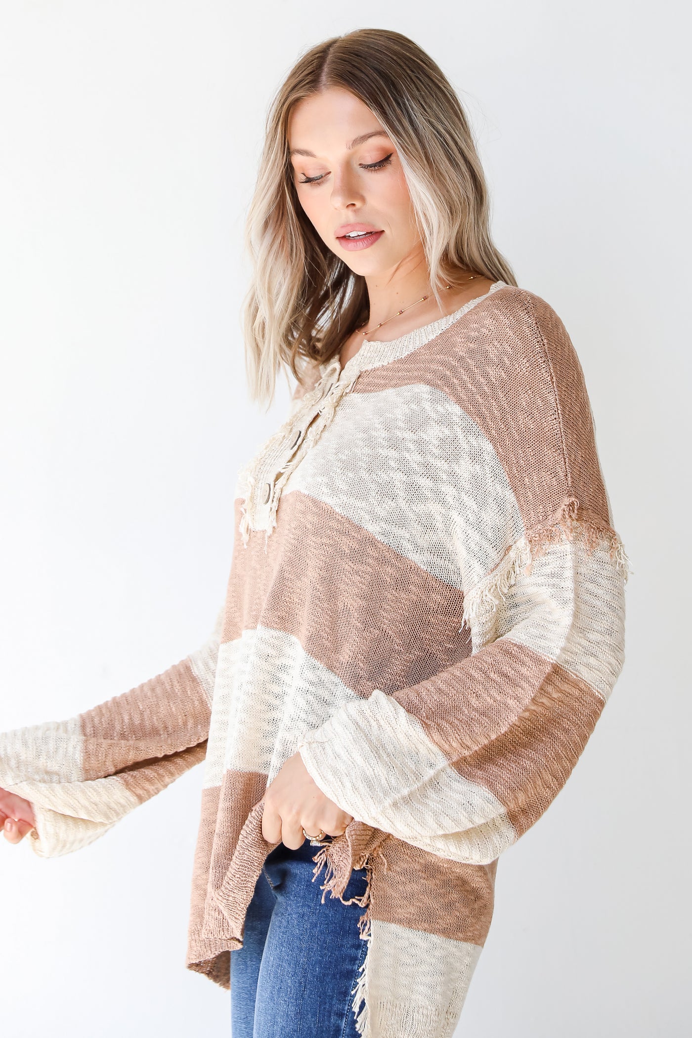 taupe striped sweater side view